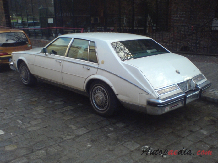 Cadillac Seville 2nd generation 1980-1985 (1985 Commemorative Edition sedan 4d),  left rear view
