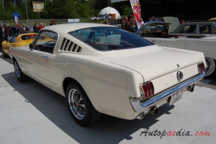 Ford Mustang 1st generation 1964-1973 (1965 289 cu in GT Fastback),  left rear view