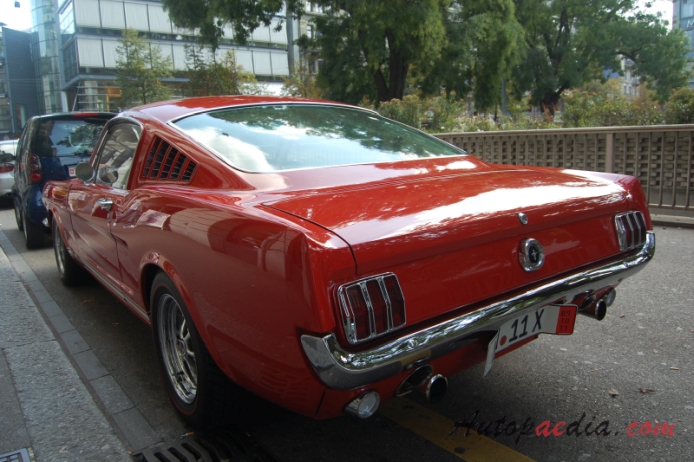Ford Mustang 1st generation 1964-1973 (1965 Fastback GT),  left rear view