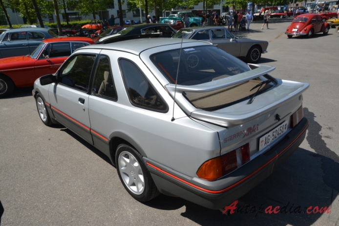 Ford Sierra Mk I 1982-1987 (1983-1985 Ford Sierra XR4i liftback 3d),  left rear view