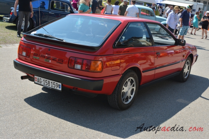 Isuzu Piazza 1st generation (JR120/130) 1980-1990 (1990 Handling by Lotus Turbo hatchback 3d), right rear view