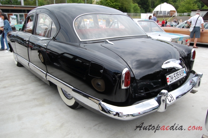 Kaiser DeLuxe 1949-1953 (1951 Anatomic sedan 4d),  left rear view