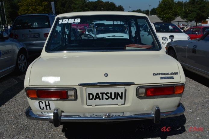 Datsun Sunny 1st generation B10 (Datsun 1000) 1966-1969 (1969 DeLuxe sedan 2d), rear view